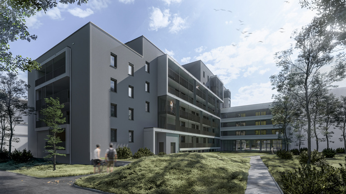 Außenansicht des E-Gebäudes des Studierendenwohnheims der FH Kufstein Tirol von der Innenhofperspektive Außenansicht des E-Gebäudes des Studierendenwohnheims der FH Kufstein Tirol von der Innenhofperspektive. Modernes Gebäude mit Grünanlage.