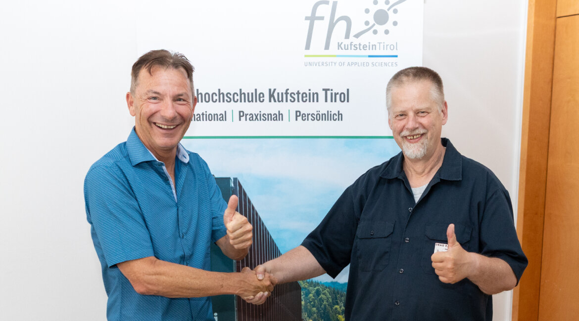 Sponsoring Tiny Torquer – Madritsch und Schmid 2025. Zwei Männer beim Handschlag mit Daumen hoch.