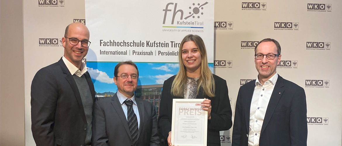 Celebrating the 2022 Research Award (from left): Director of Studies Prof. (FH) Dr. Peter Dietrich, Prof. (FH) PD Dr. Christoph Hauser (thesis supervisor), award winner Anna Thaler, MA, and Prof. (FH) PD Dr. Mario Döller, Rector of the University of Applied Sciences.